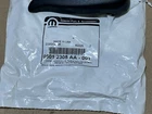 New Genuine Mopar Seat Recliner Handle Oe 05012305AA. Price: $24.88.