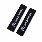 Seatbelt Covers - Mopar New. Price: $32.00.