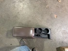 Original Toyota Center Armrest And Cup Holder . Used. Price: $150.00.
