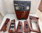 03-08 Toyota Corolla Dash Center And Window Bezel Wood Grain Set Oem Used. Price: $175.87.